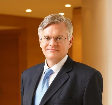 Mr. Peter Burnett OBE BBS JP